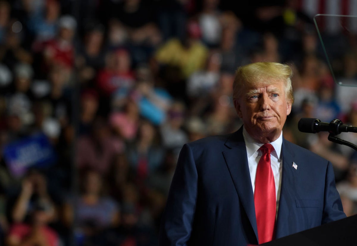 Protester expelled from Trump’s Ohio rally after waving banner blaming him for factory closure