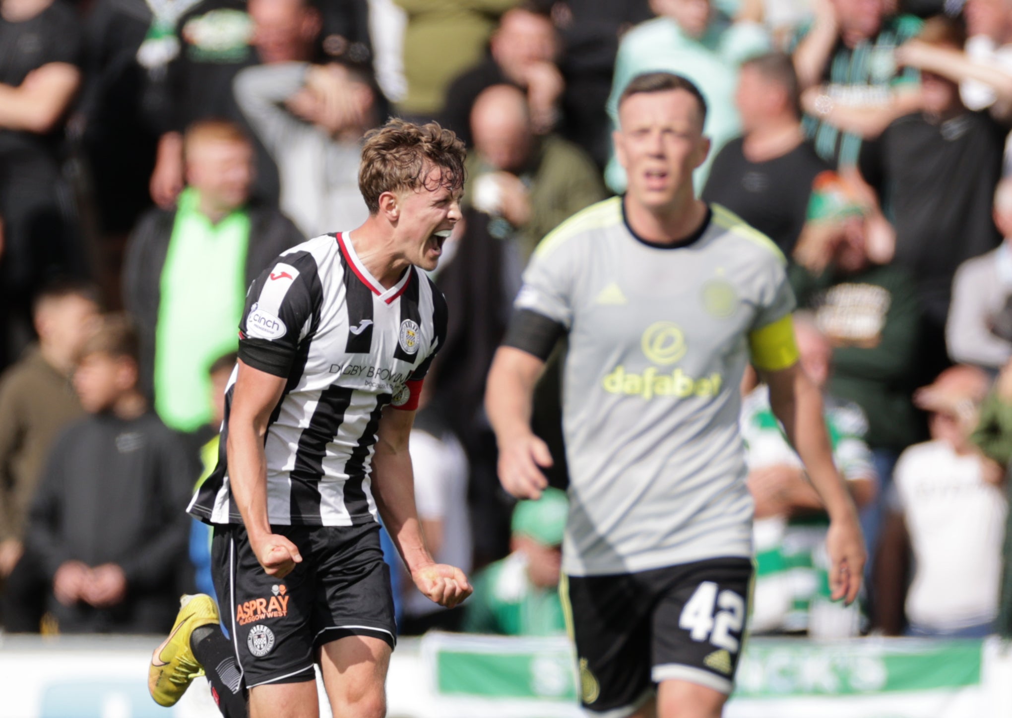 St Mirren’s Mark O’Hara celebrates as Celtic skipper Callum McGregor regroups (Steve Welsh/PA)