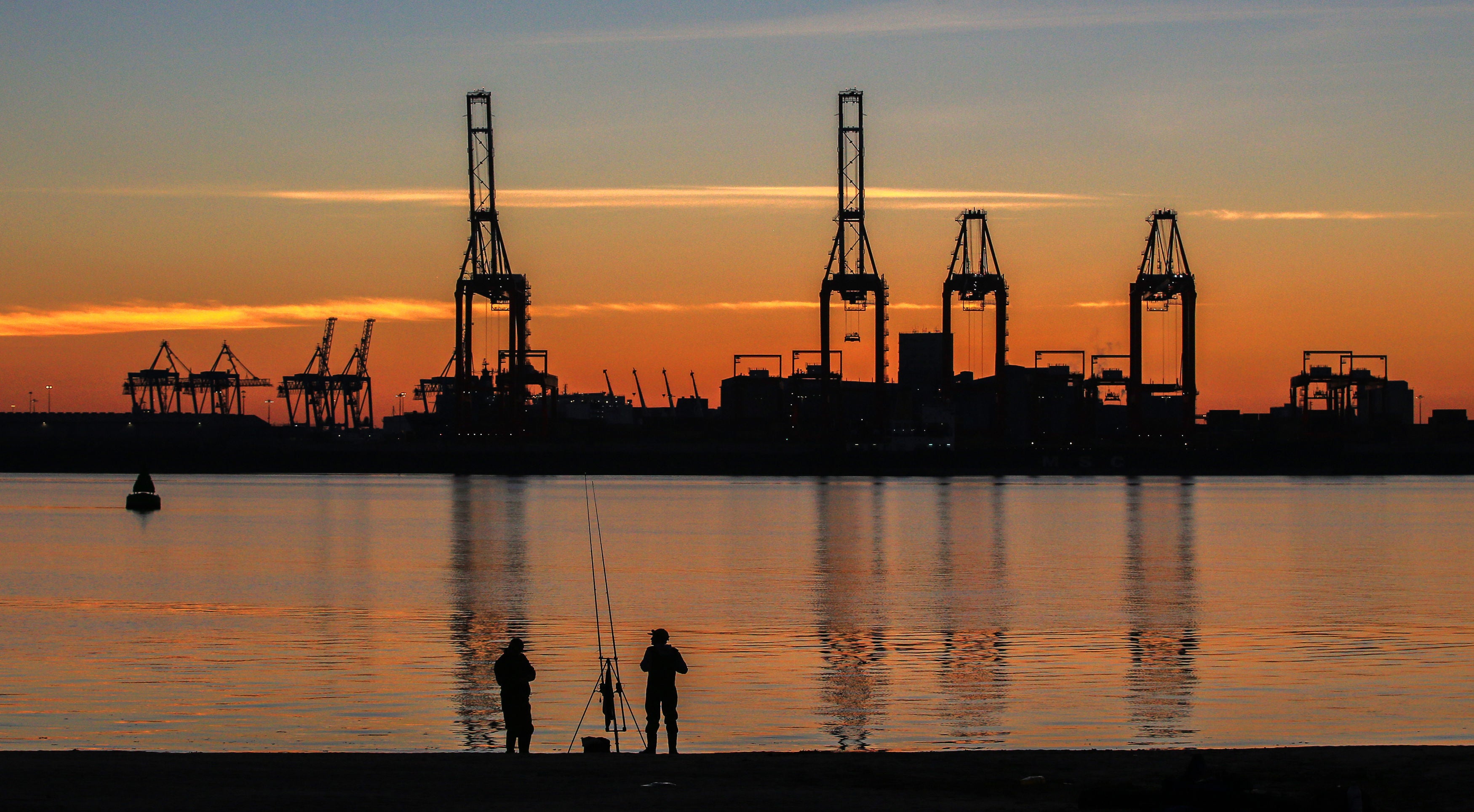 The sun rises over the Port of Liverpool and the River Mersey (Peter Byrne/PA)