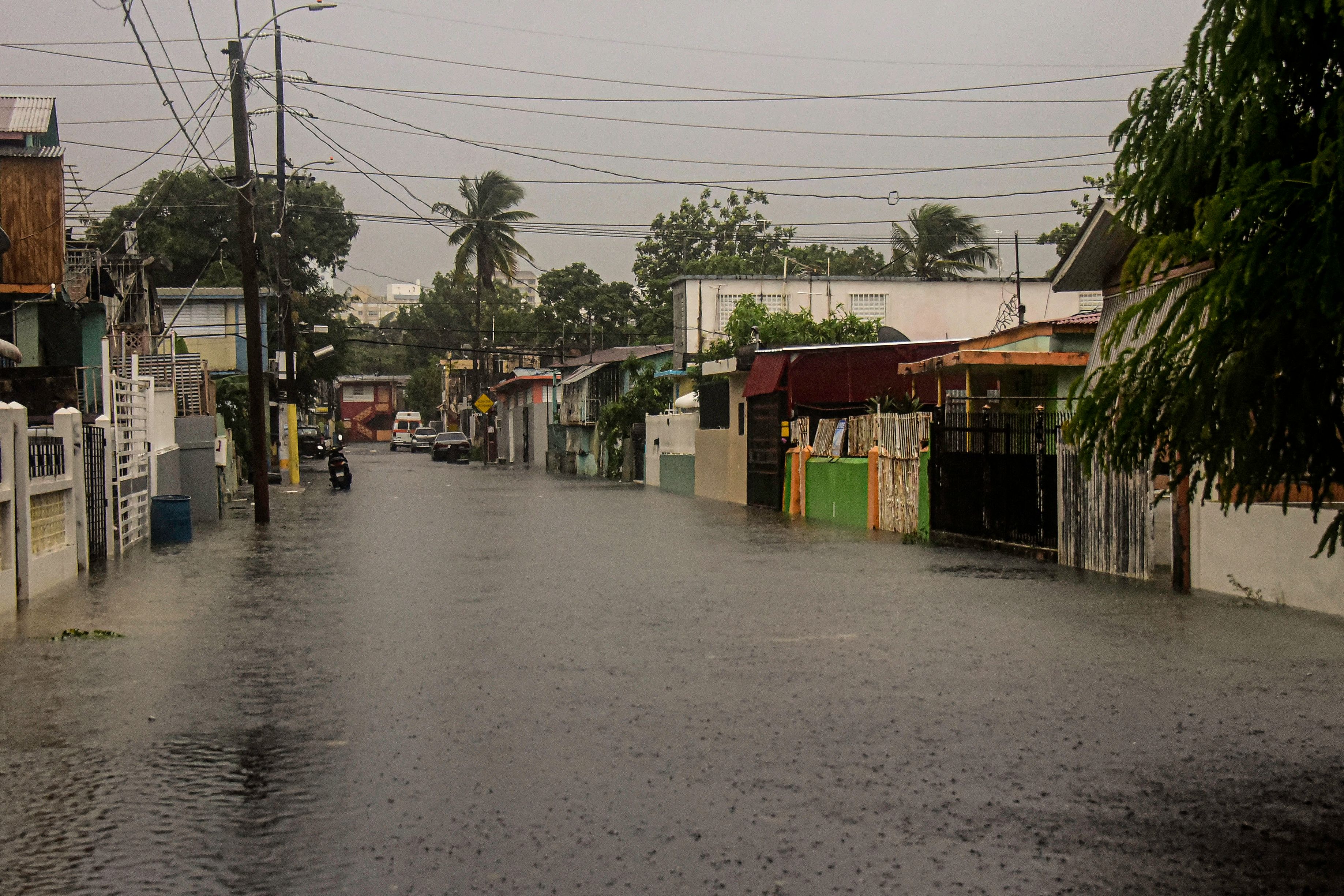 A flooded road is seen during the passage of hurricane Fiona in Villa Blanca, Puerto Rico, on 18 September 2022