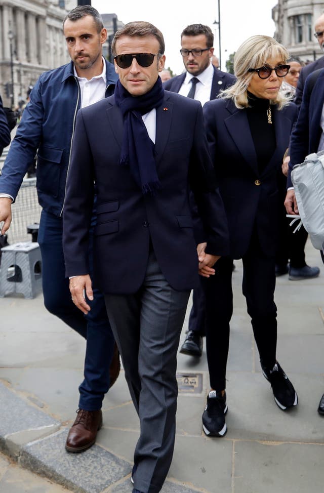 <p>French President Emmanuel Macron and his wife Brigitte Macron (right) arrive at Westminster Hall to pay their respects to Britain’s late Queen Elizabeth II in London</p>
