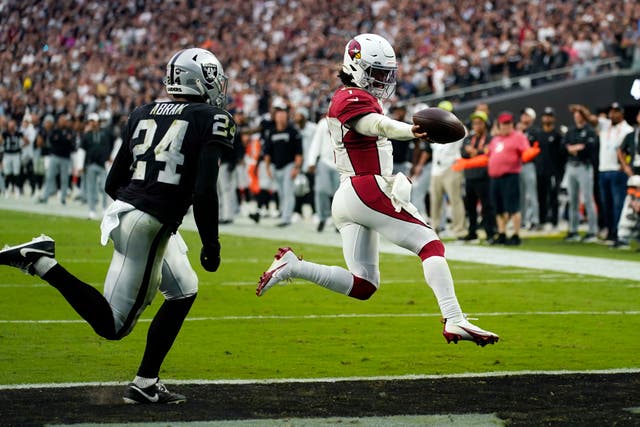Kyler Murray (right) led the Arizona Cardinals to a famous victory in Sin City as his side racked up 22 unanswered points to snatch the game 29-23 in overtime (John Locher/AP)