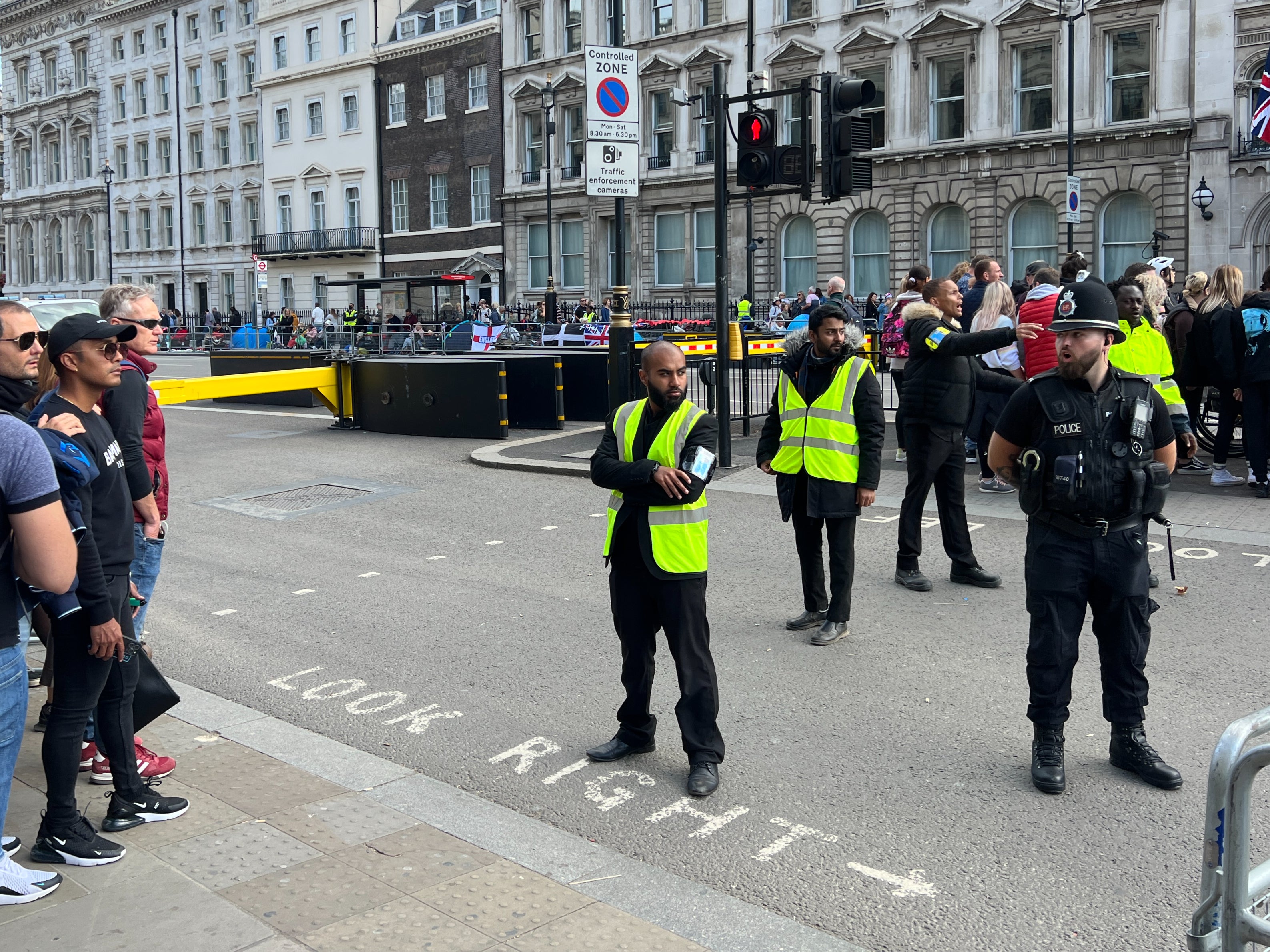 Crowd control: Pedestrians in Westminster on Sunday afternoon