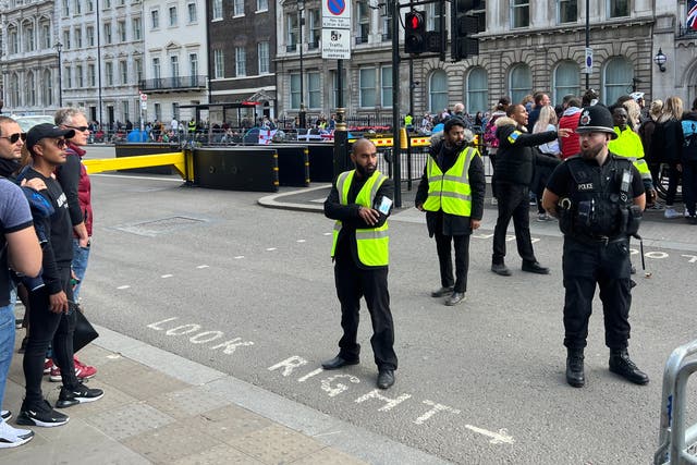 <p>Crowd control: Pedestrians in Westminster on Sunday afternoon</p>
