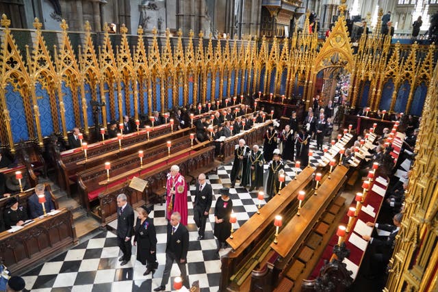 Guests and officials take their places at the state funeral of the Queen (Dominic Lipinski/PA)