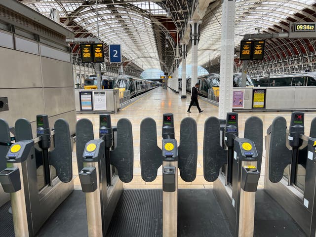<p>Going nowhere: Empty trains at London Paddington, which will remain closed all day on Monday </p>
