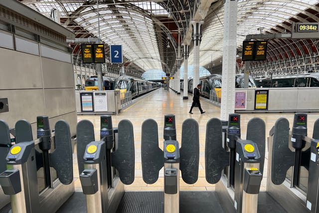 <p>Going nowhere: Empty trains at London Paddington, which will remain closed all day on Monday </p>