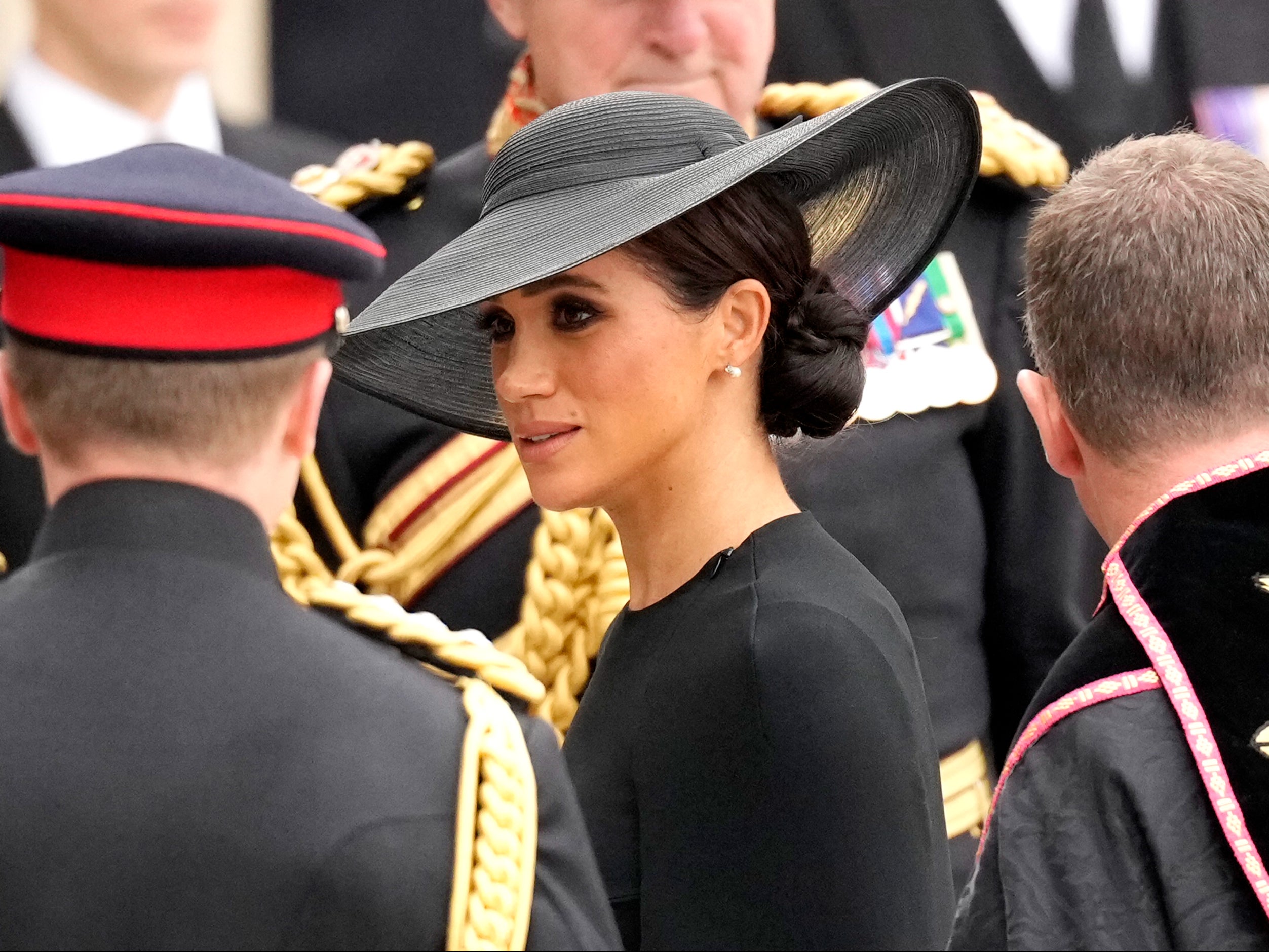 Meghan Markle arrives at the Queen's funeral.