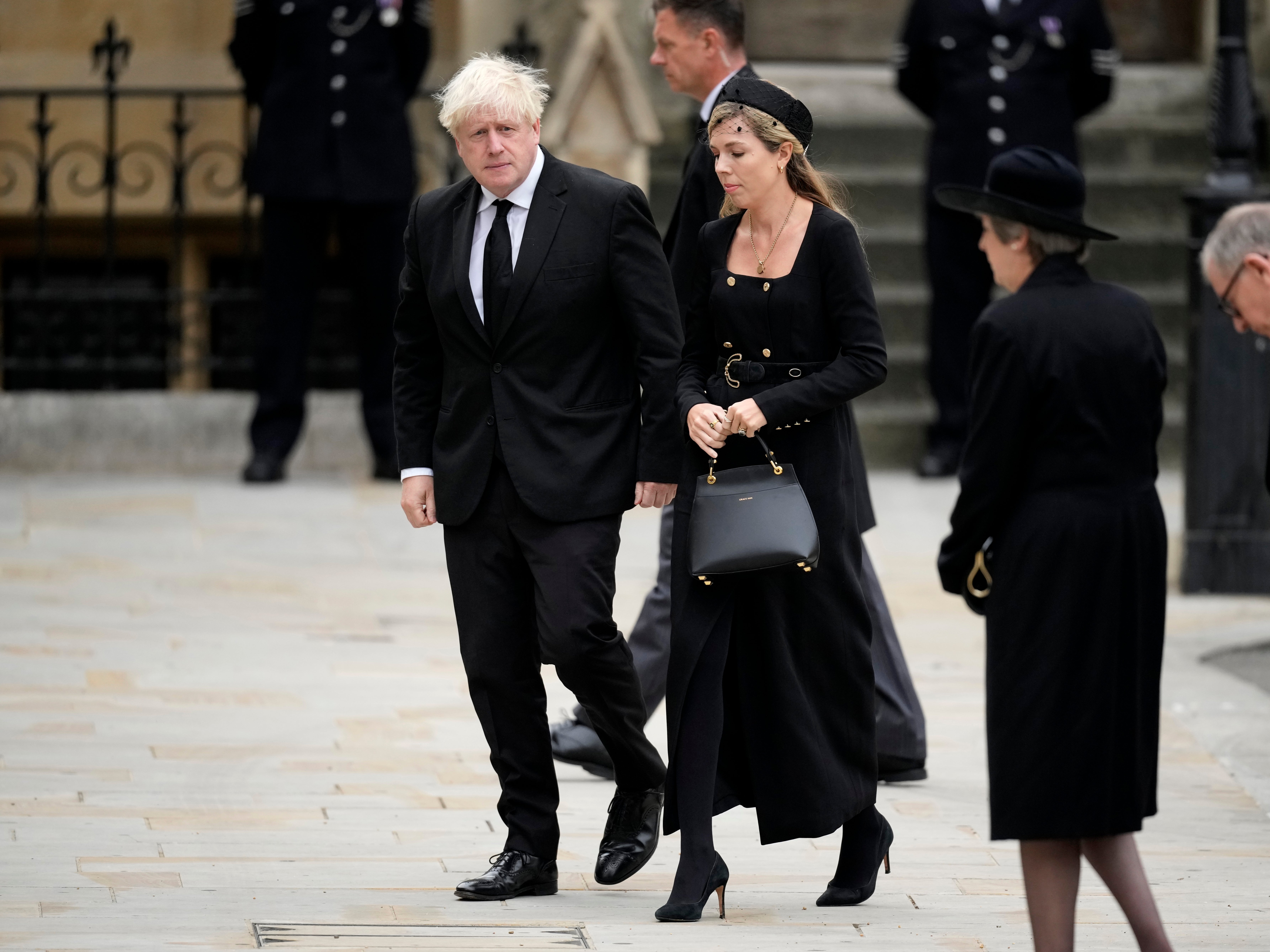 Carrie and Boris Johnson arrive at Westminster Abbey on 19 September 2022