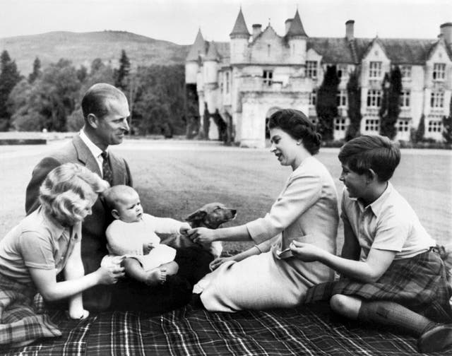 <p>Britain’s Queen Elizabeth II, Prince Philip, Duke of Edinburgh and their three children Charles, Anne and Prince Andrew pose in the grounds of Balmoral Castle on 9 September 1960</p>