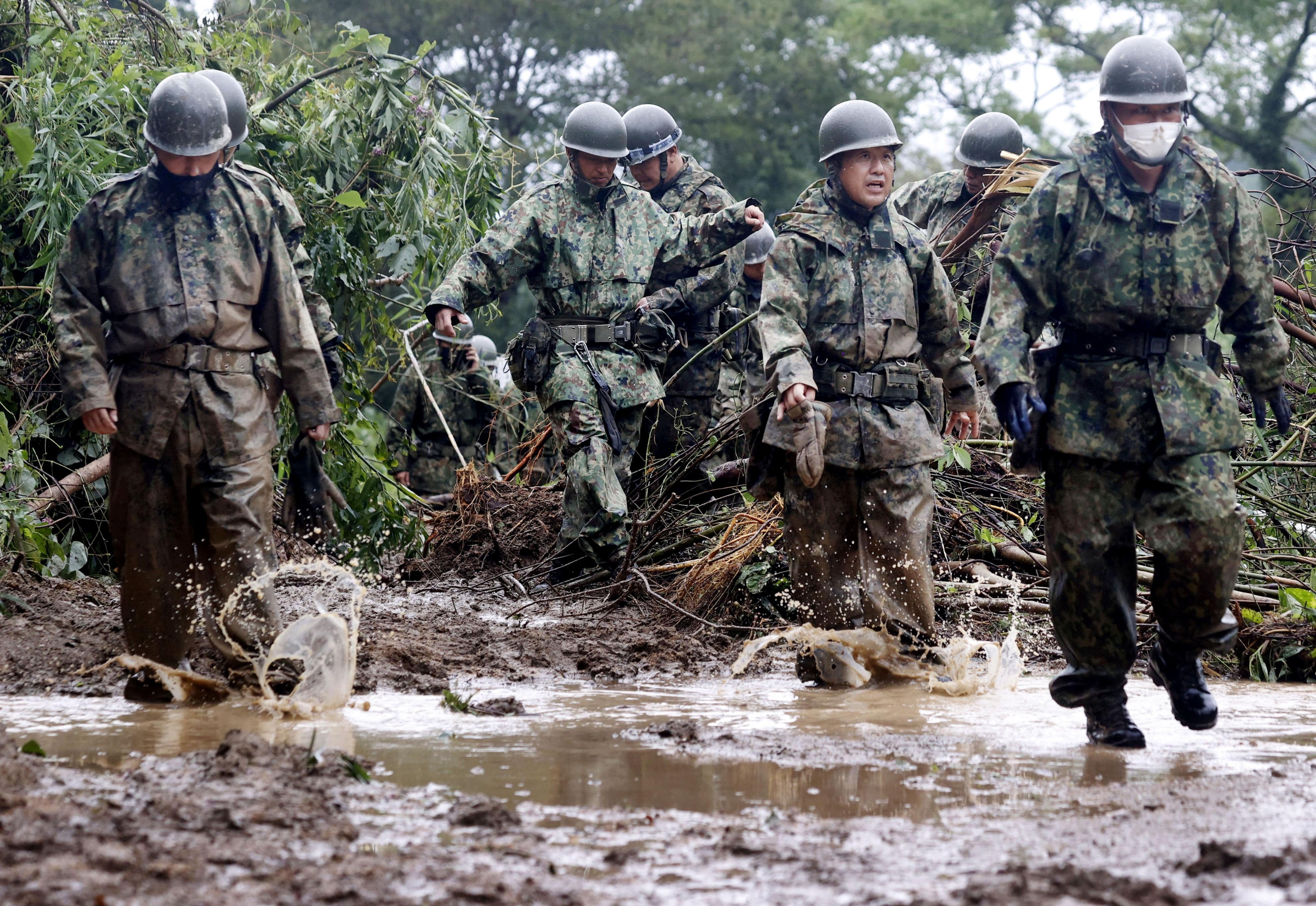 File. Japanese Self-Defence Force [SDF] soldiers conduct search and rescue operation at a landslide site caused by Typhoon Nanmadol in Mimata Town, Miyazaki prefecture, Japan, 19 September 2022