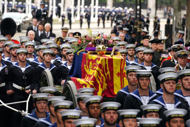 The Queen’s coffin was carried on the State Gun Carriage which was towed by Royal Navy sailors (Peter Byrne/PA)