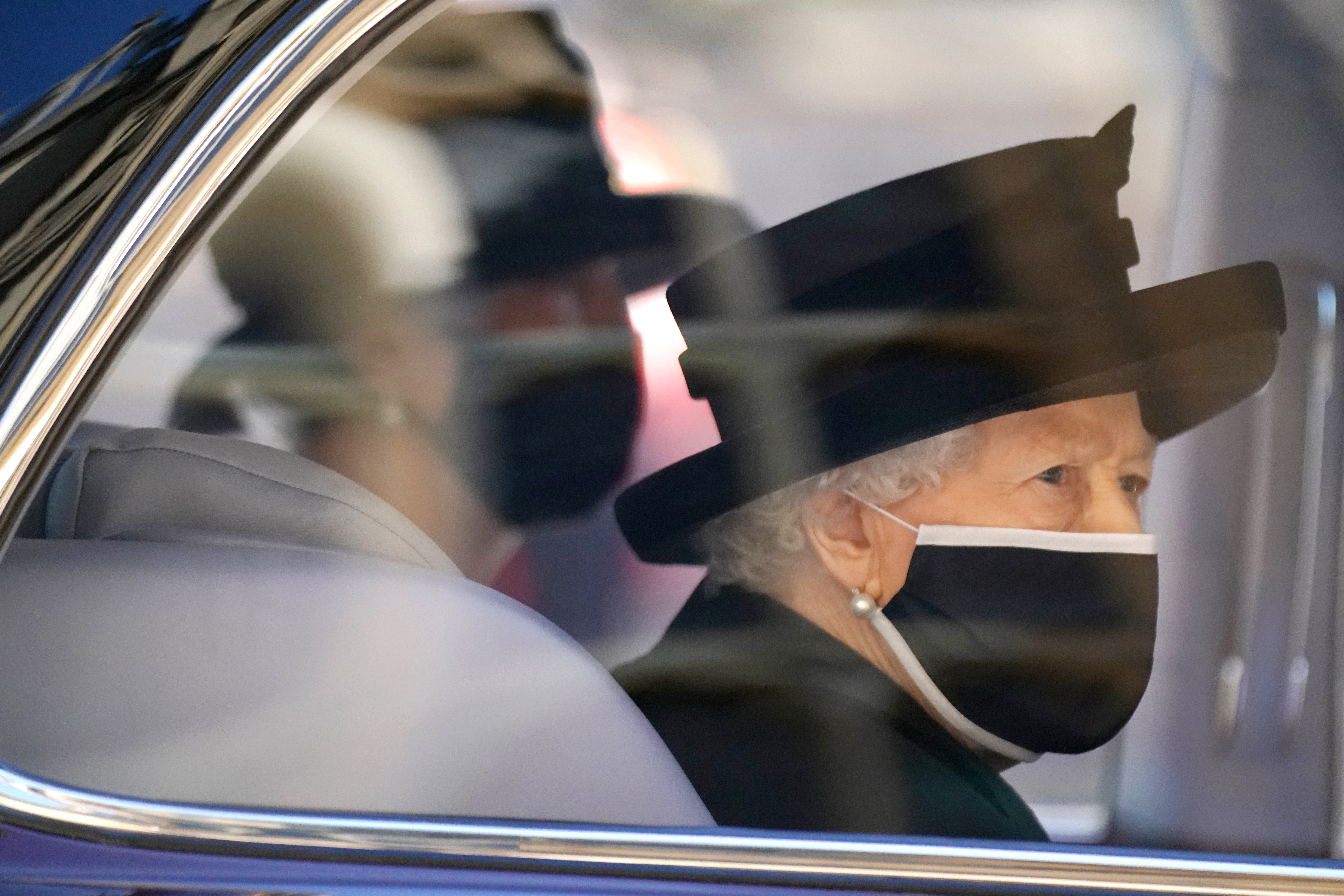Queen Elizabeth II arrives for the funeral of Prince Philip alongside Susan Hussey