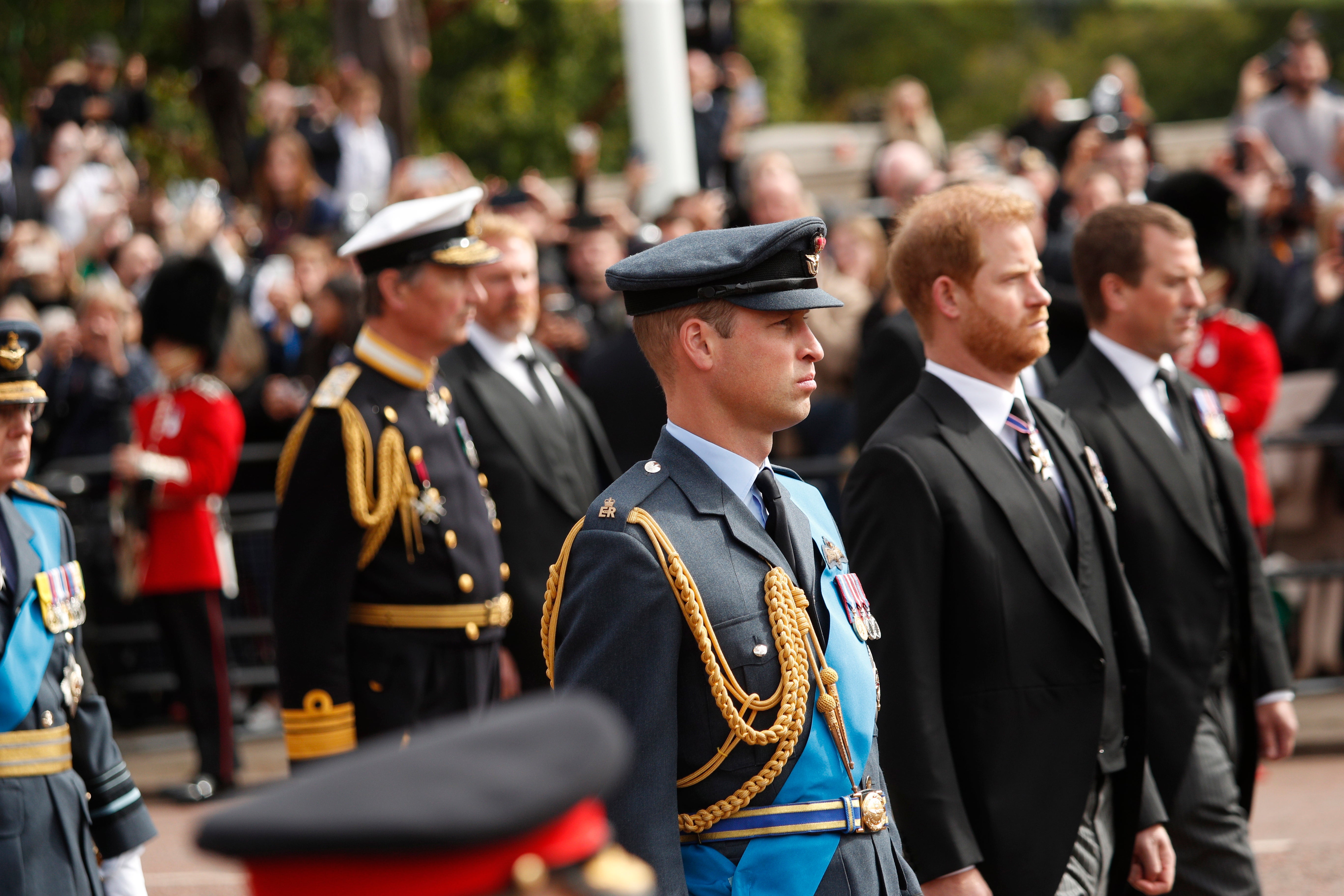 William and Harry follow the Queen’s coffin in the procession from Westminster Abbey to Wellington Arch