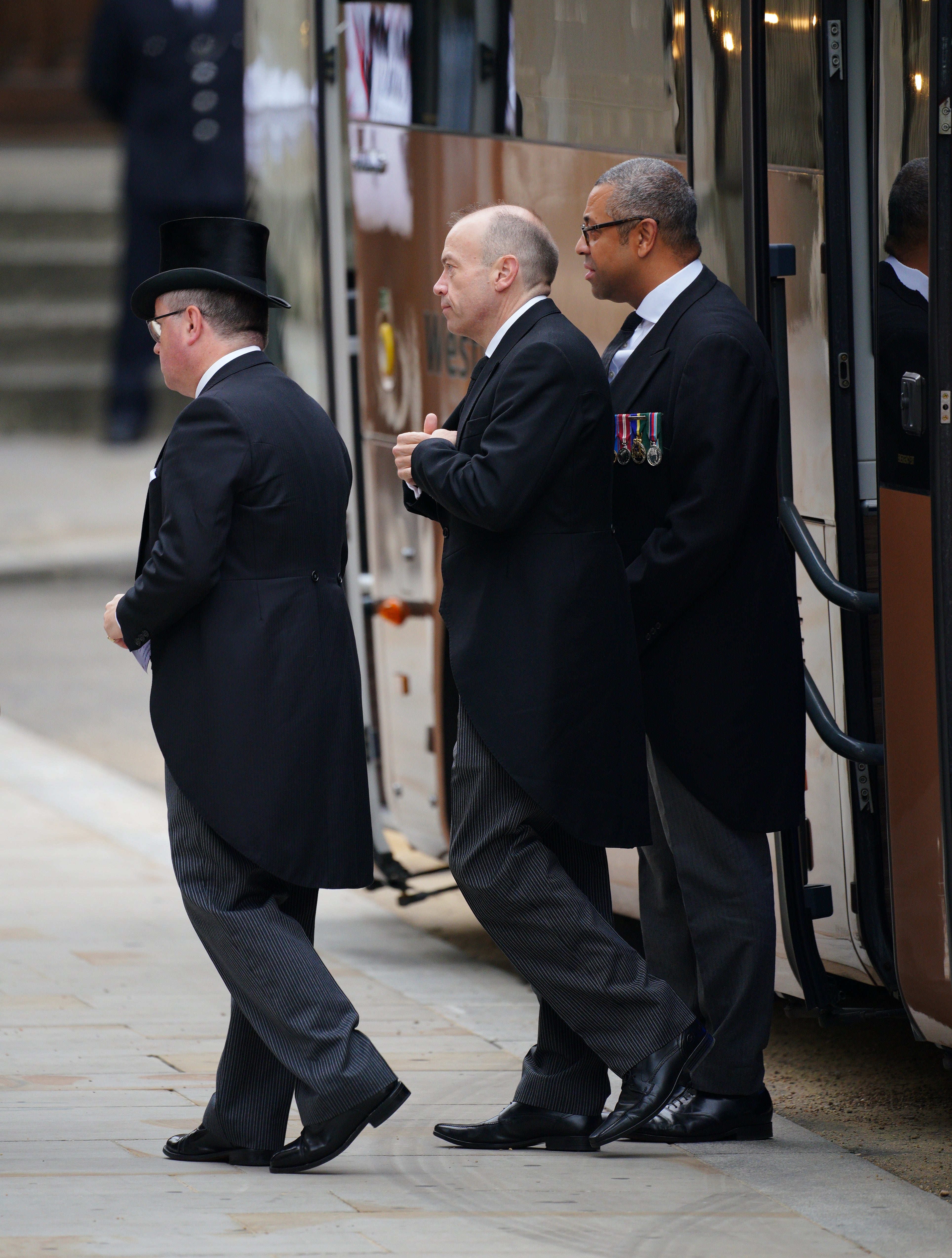 Welsh Secretary Robert Buckland, Secretary of State for Northern Ireland Chris Heaton-Harris and Foreign Secretary James Cleverly arrive at the funeral (Peter Byrne/PA)