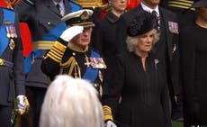 Queen funeral – latest: King Charles salutes coffin as it makes final journey to Windsor Castle