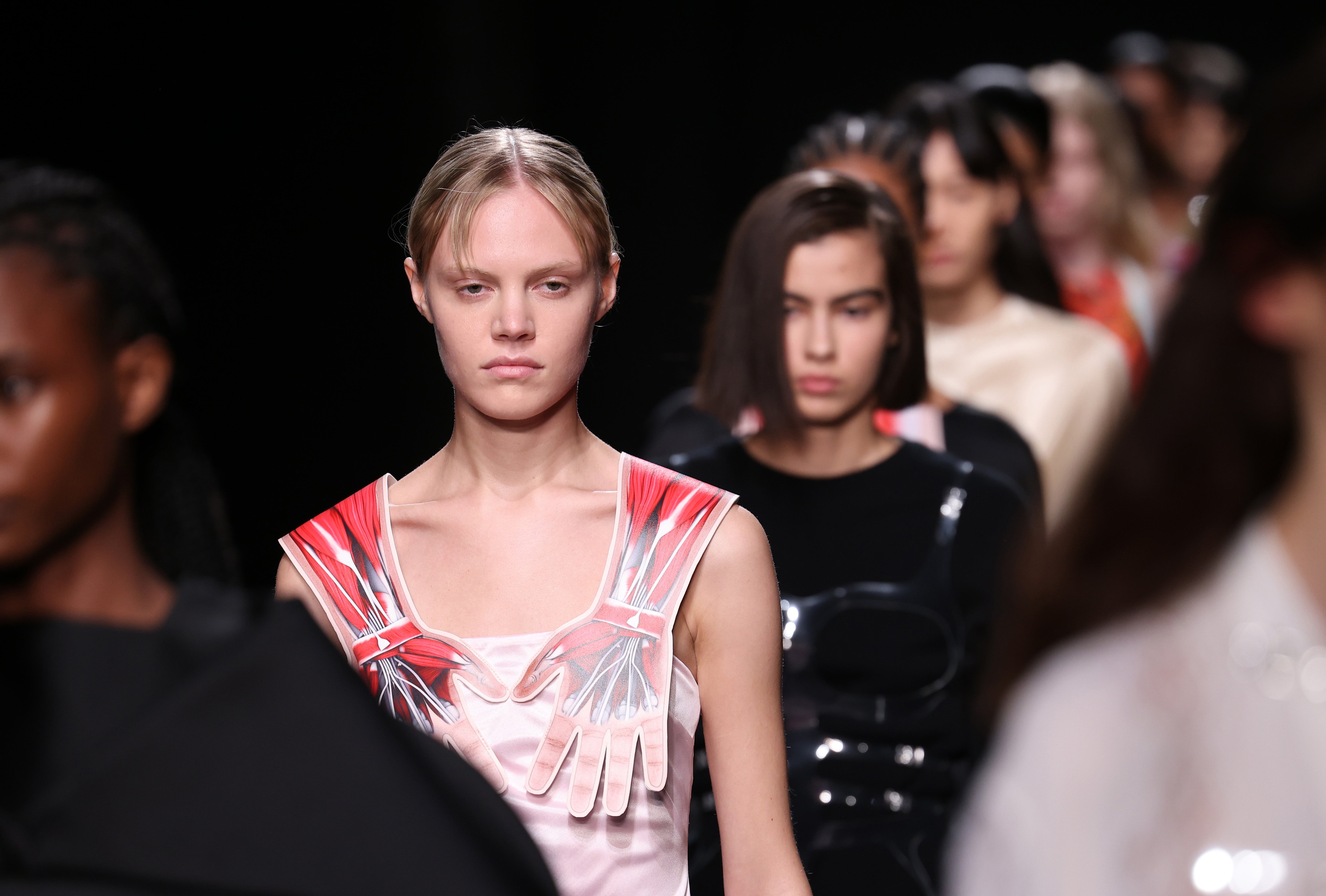 Models walk the runway at the Christopher Kane show during London Fashion Week