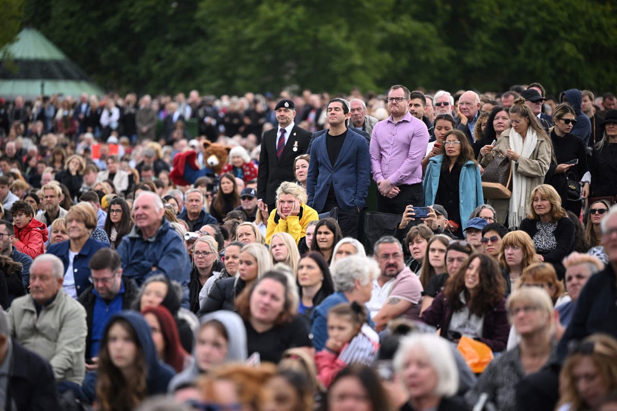 From city centre screens to airports, Britons watch historic funeral for Queen