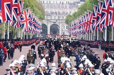 Sombre and spectacular: Thousands line streets to say farewell to the Queen in a day for the history books