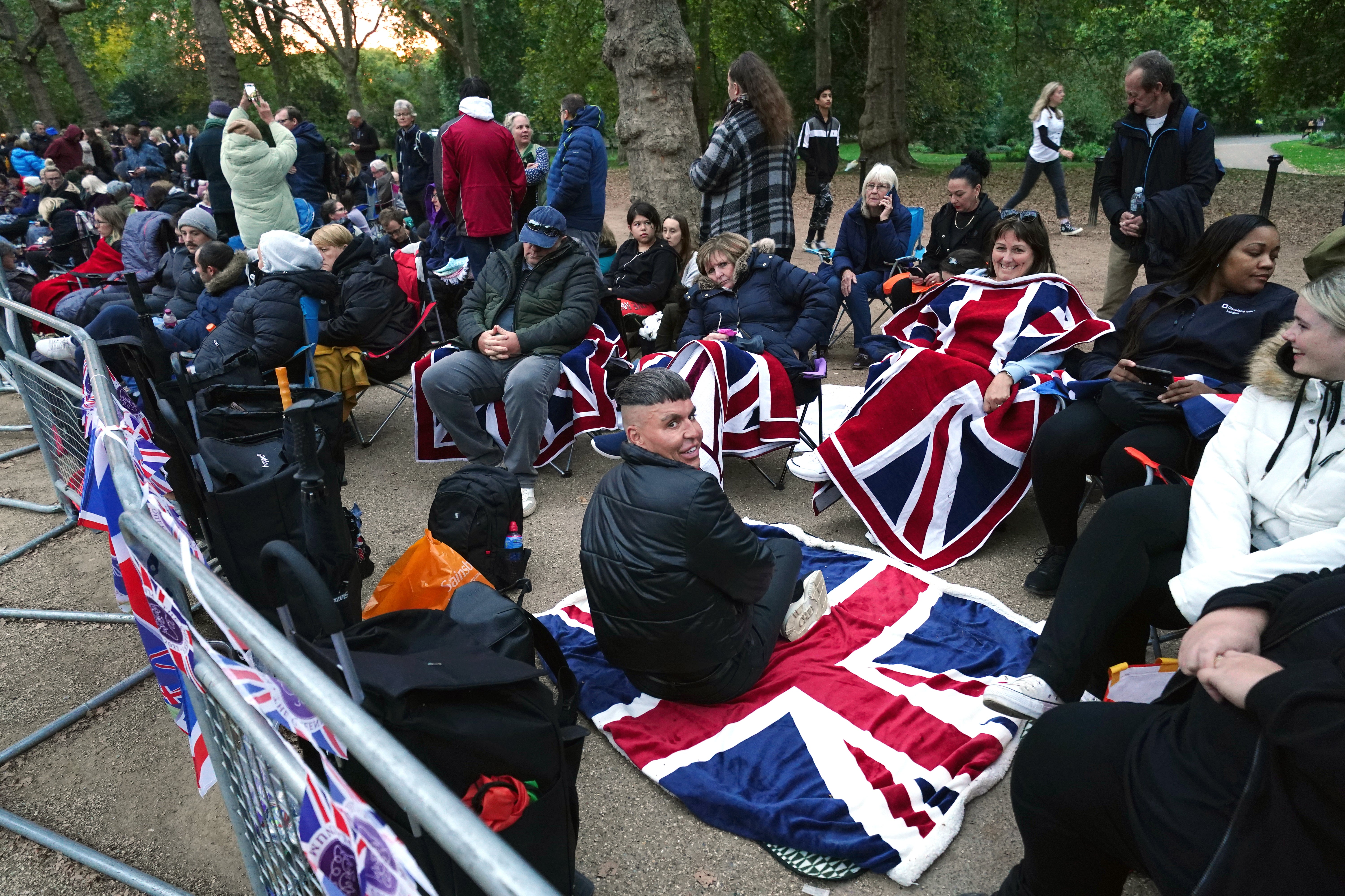 Members of the public in The Mall, central London, ahead of the state funeral (Mike Egerton/PA)