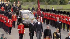 Queen’s coffin arrives in Windsor where late monarch will be reunited with Prince Philip