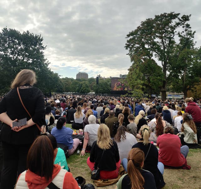 <p>Thousands sit and watch the Queen’s funeral at Hyde Park</p>