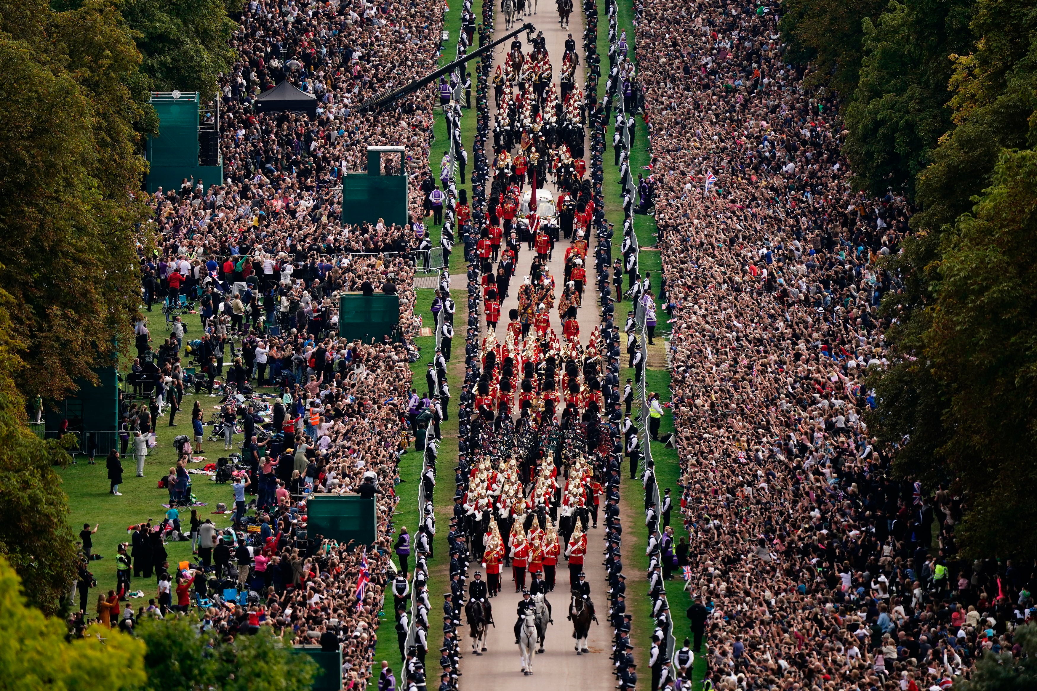 The procession travels down the Long Walk towards Windsor Castle