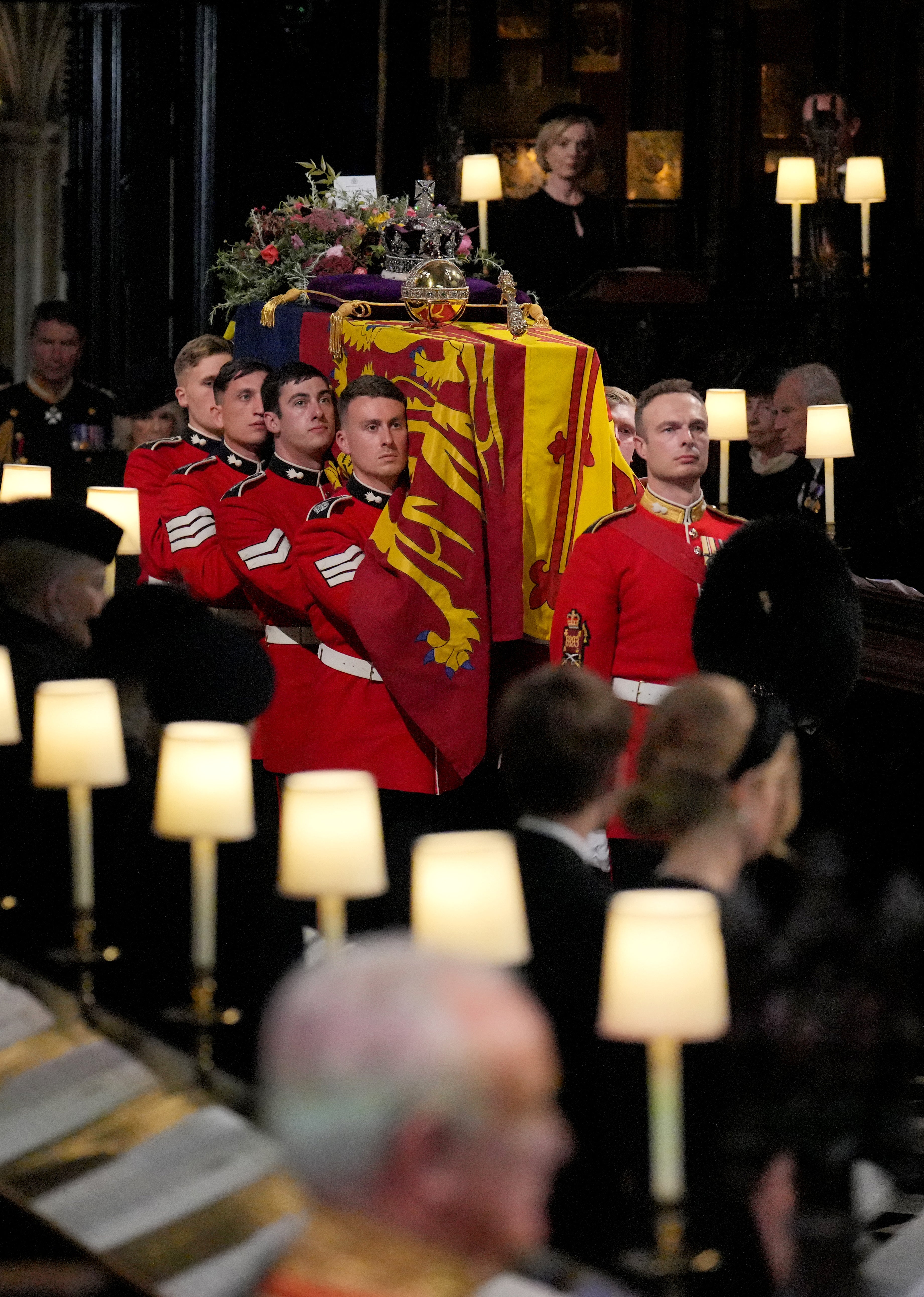 The coffin of Queen Elizabeth II is carried by the Bearer Party in to the Committal Service at St George’s Chapel in Windsor Castle, Berkshire (Victoria Jones/PA)