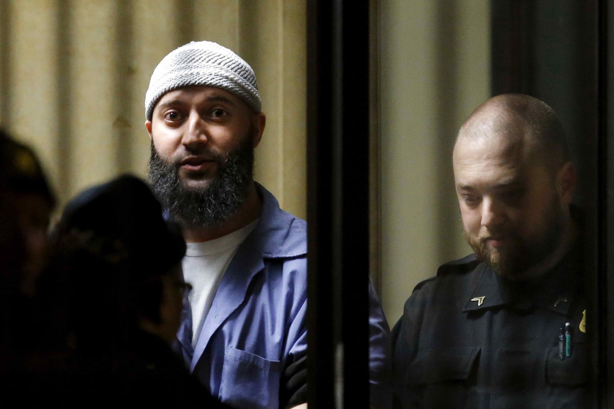 Serial’s Adnan Syed walks free from prison as judge overturns 2000 murder conviction