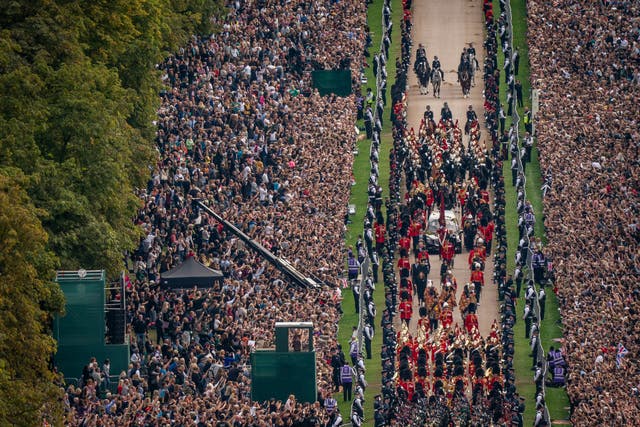 The Ceremonial Procession of the coffin of Queen Elizabeth II travels down the Long Walk as it arrives at Windsor Castle for the Committal Service at St George’s Chapel (Aaron Chown/PA)