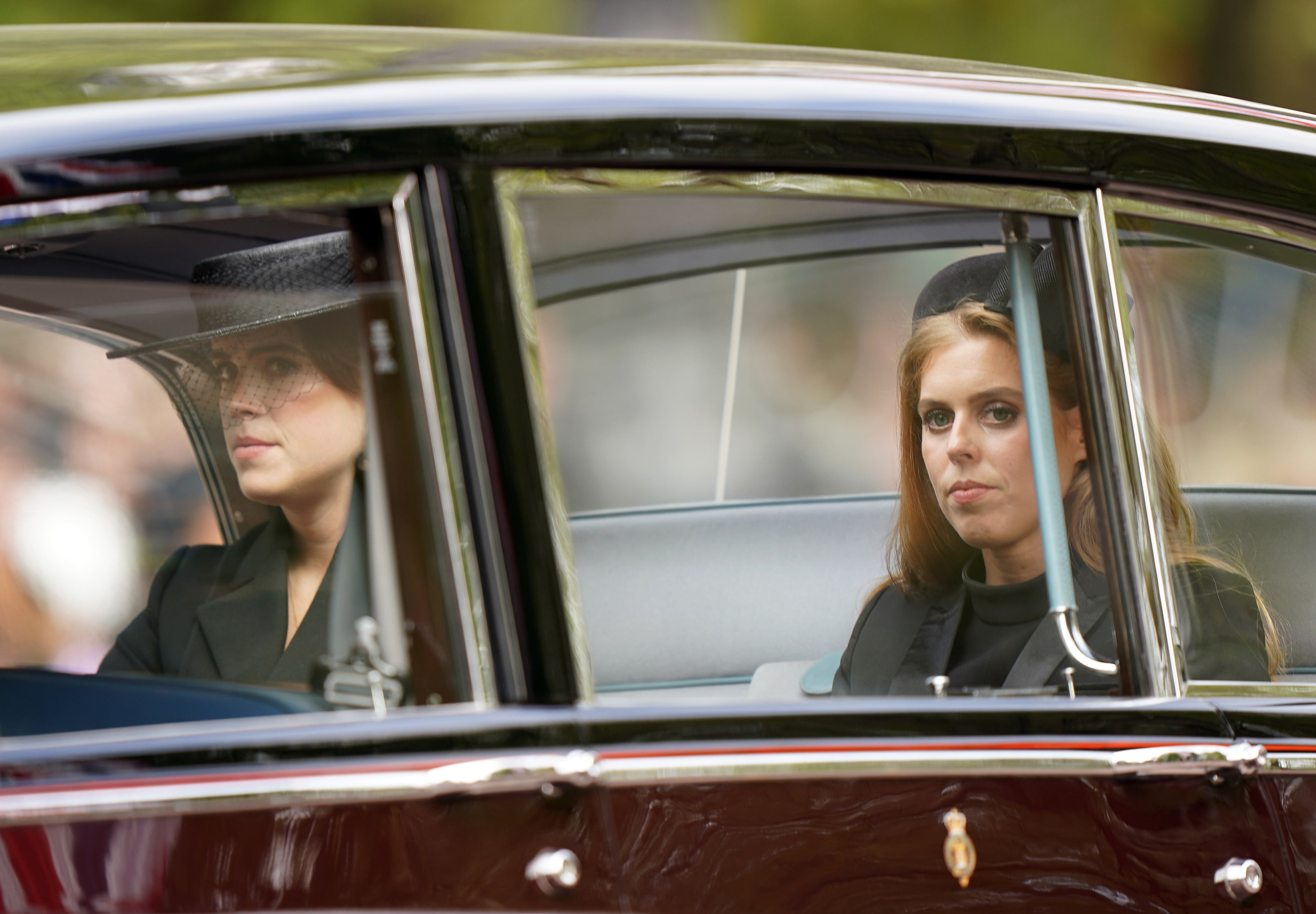 Eugenie and Beatrice at the procession after the Queen’s state funeral (Tim Goode/PA)
