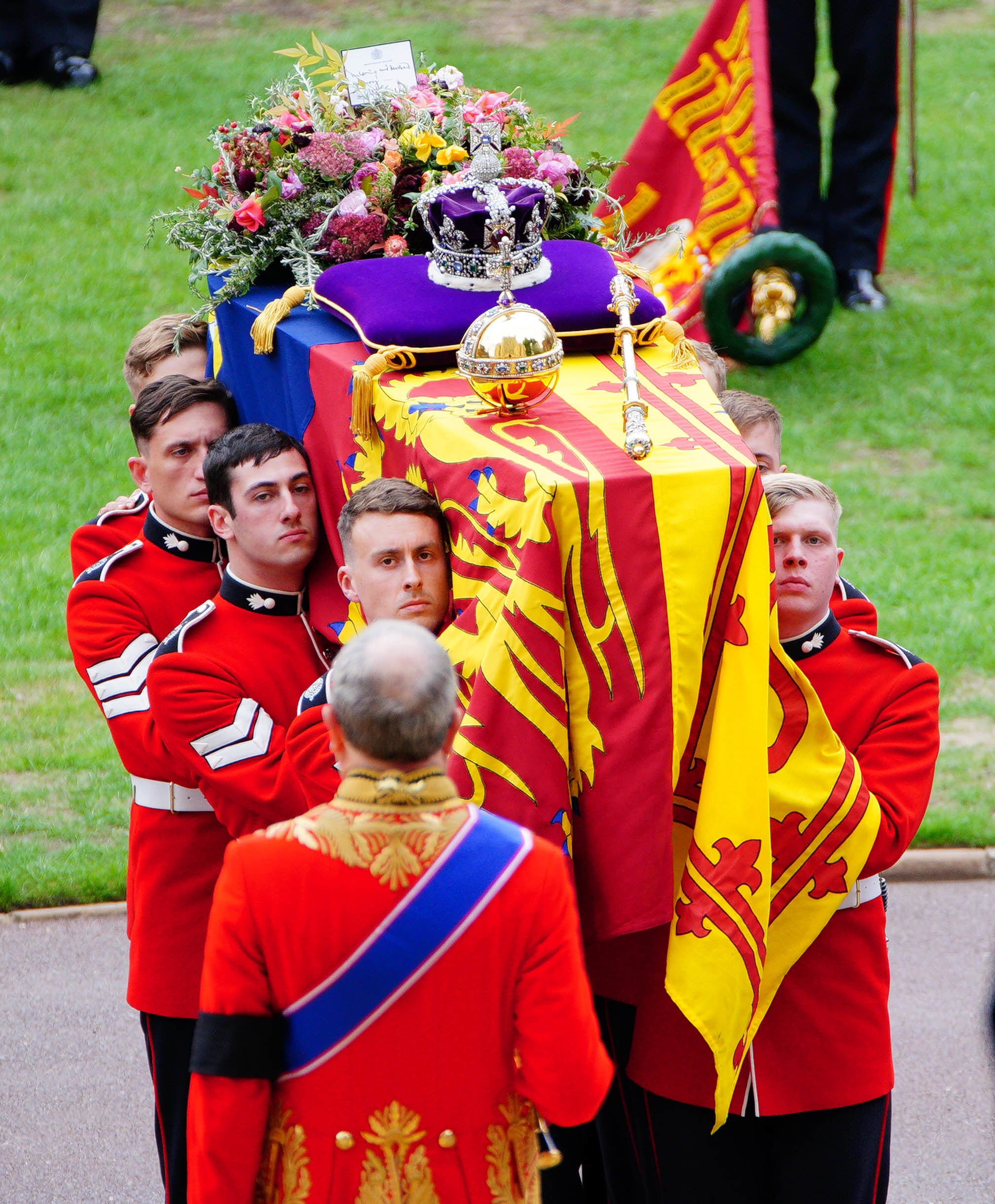 Coffin bearers carry the Queen into St George’s Chapel (Ben Birchall/PA)