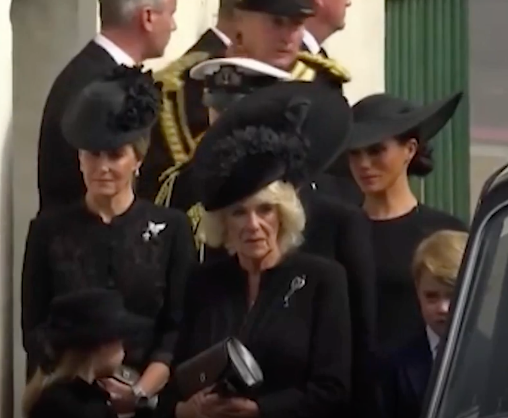 Meghan Markle smiles at Princess Charlotte during Queen's funeral