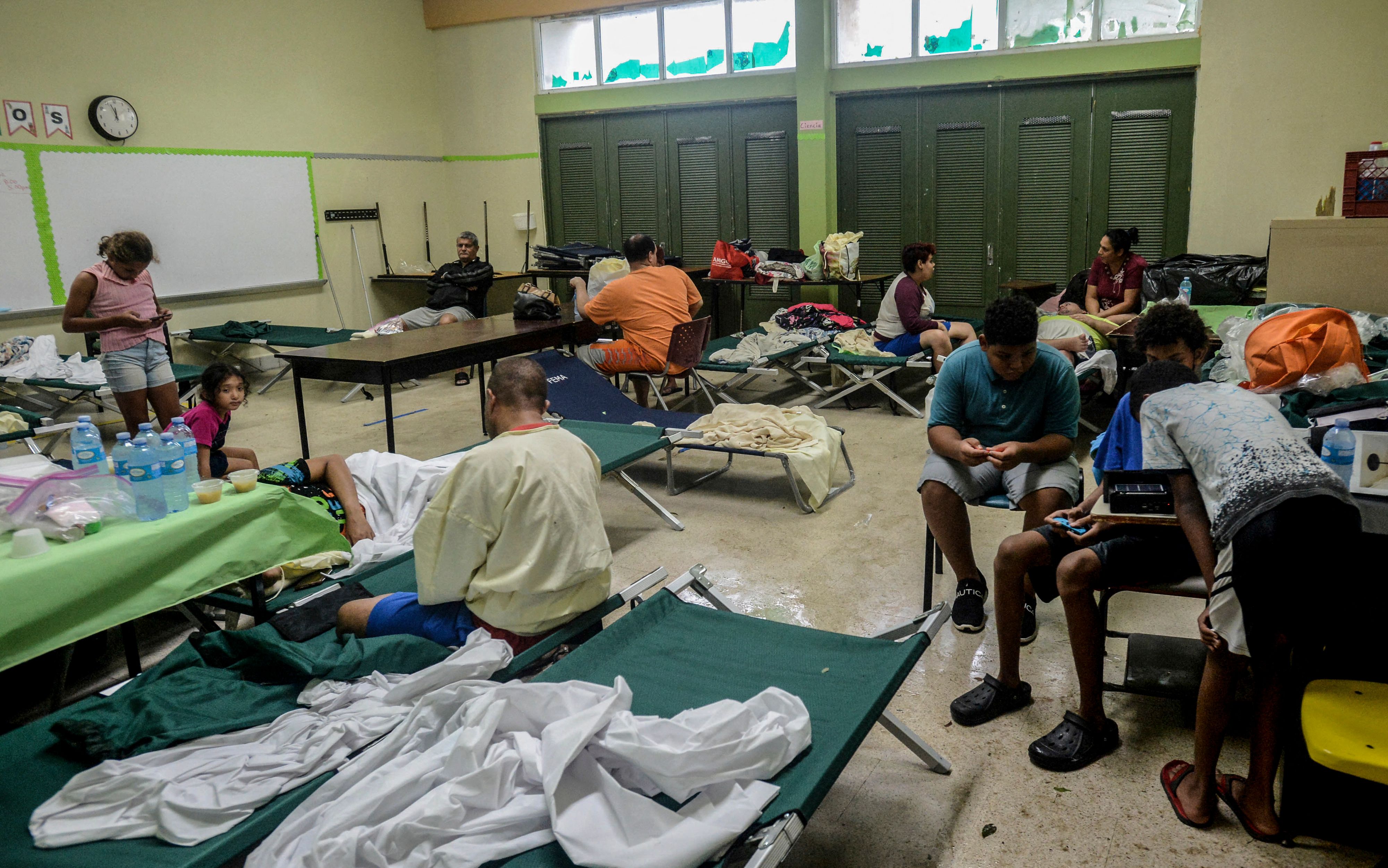 People take shelter from the hurricane in Salinas, Puerto Rico
