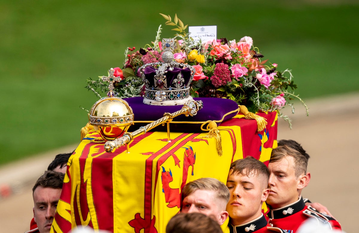 Queen buried alongside late husband at Windsor Castle in private service