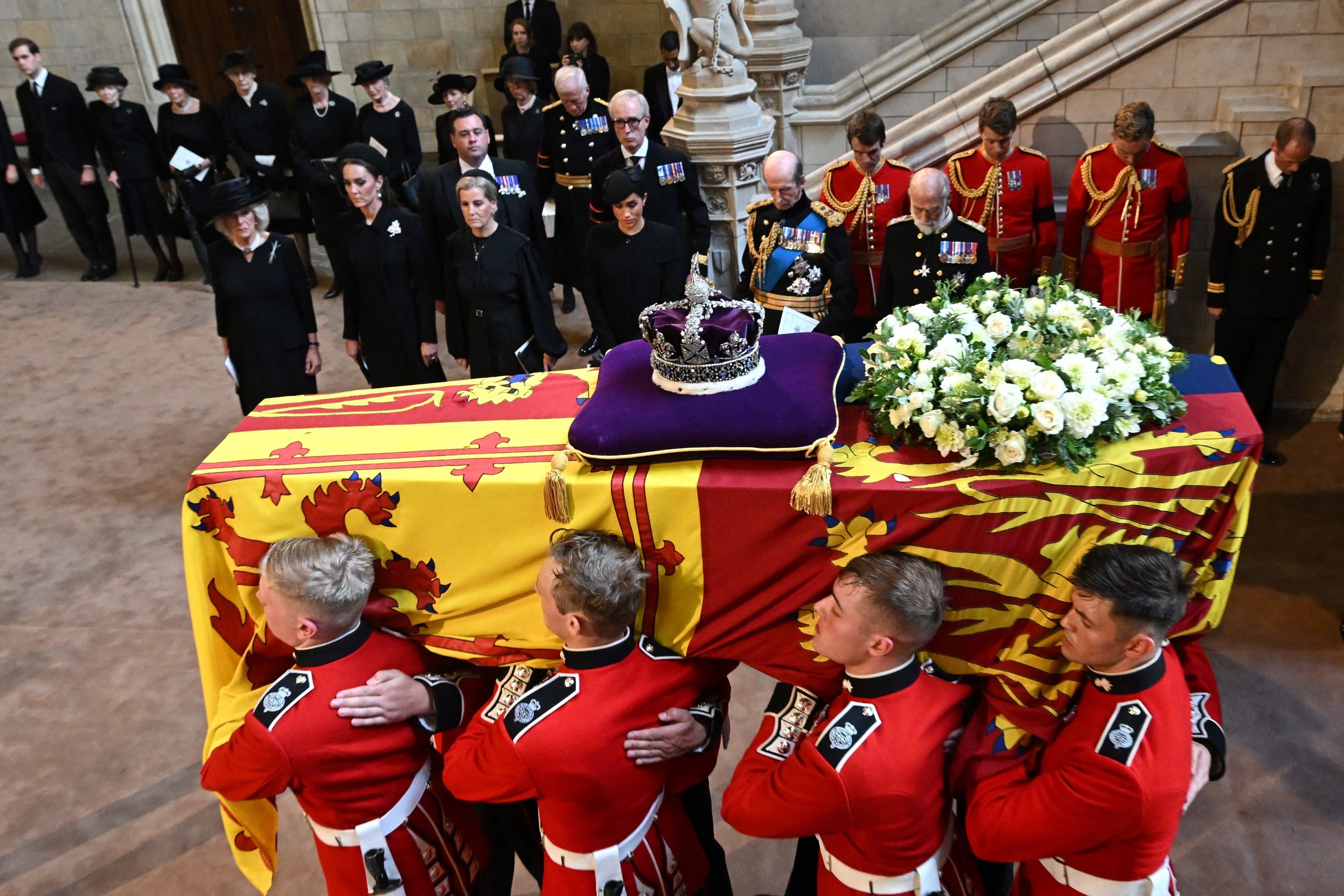 Pallbearers from The Queen's Company, 1st Battalion Grenadier Guards carry the coffin of Queen Elizabeth II