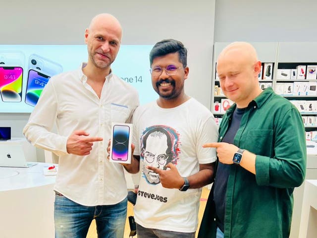 <p>Dheeraj Palliyil with his iPhone 14 at an Apple shop in Dubai</p>