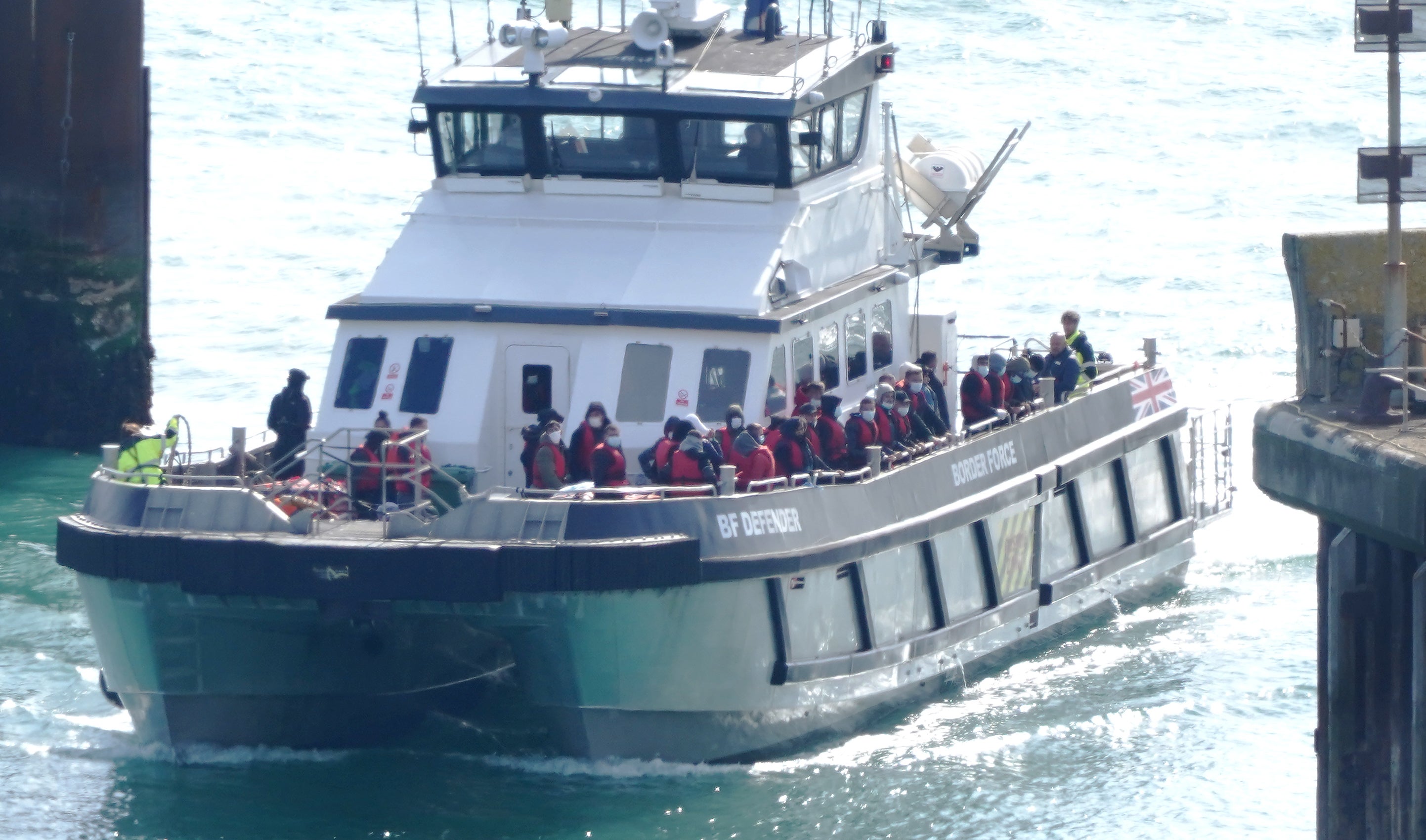 A group of people thought to be migrants is brought in to Dover, Kent, onboard a Border Force vessel following a small boat incident in the Channel. Picture date: Tuesday September 20, 2022 (Gareth Fuller/PA)