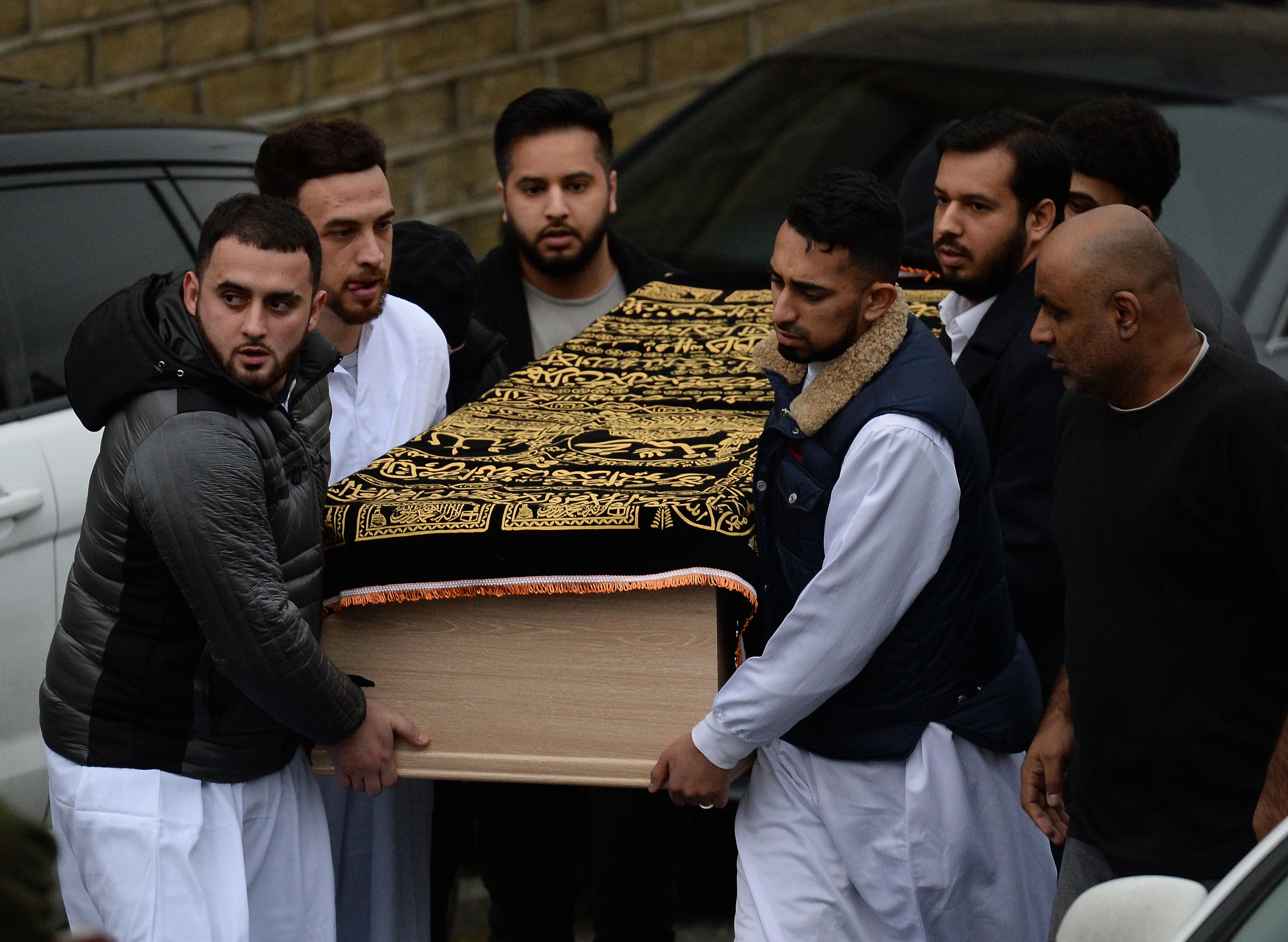 The coffin of Yassar Yaqub is carried towards Masjid Bilal in Huddersfield (Anna Gowthorpe/PA)