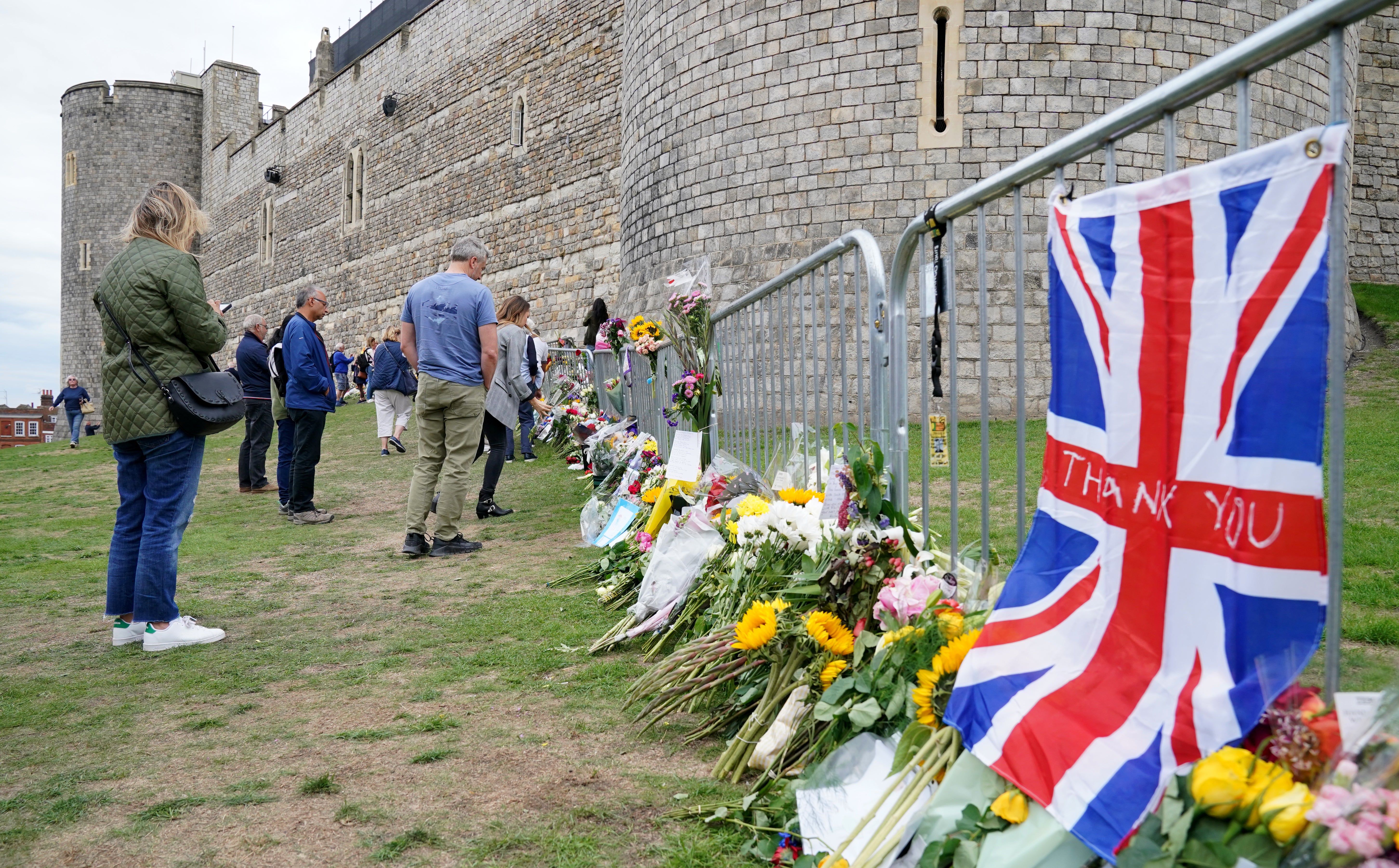 Well-wishers view floral tributes at Windsor Castle (Jonathan Brady/PA)