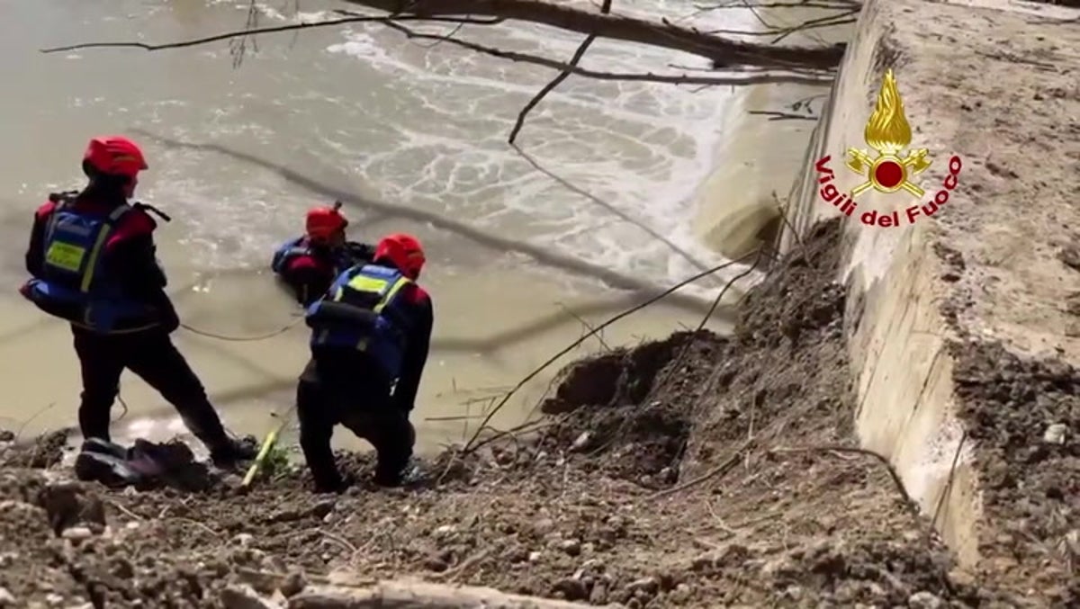 Italian firefighters search for missing woman and child in Nevola river