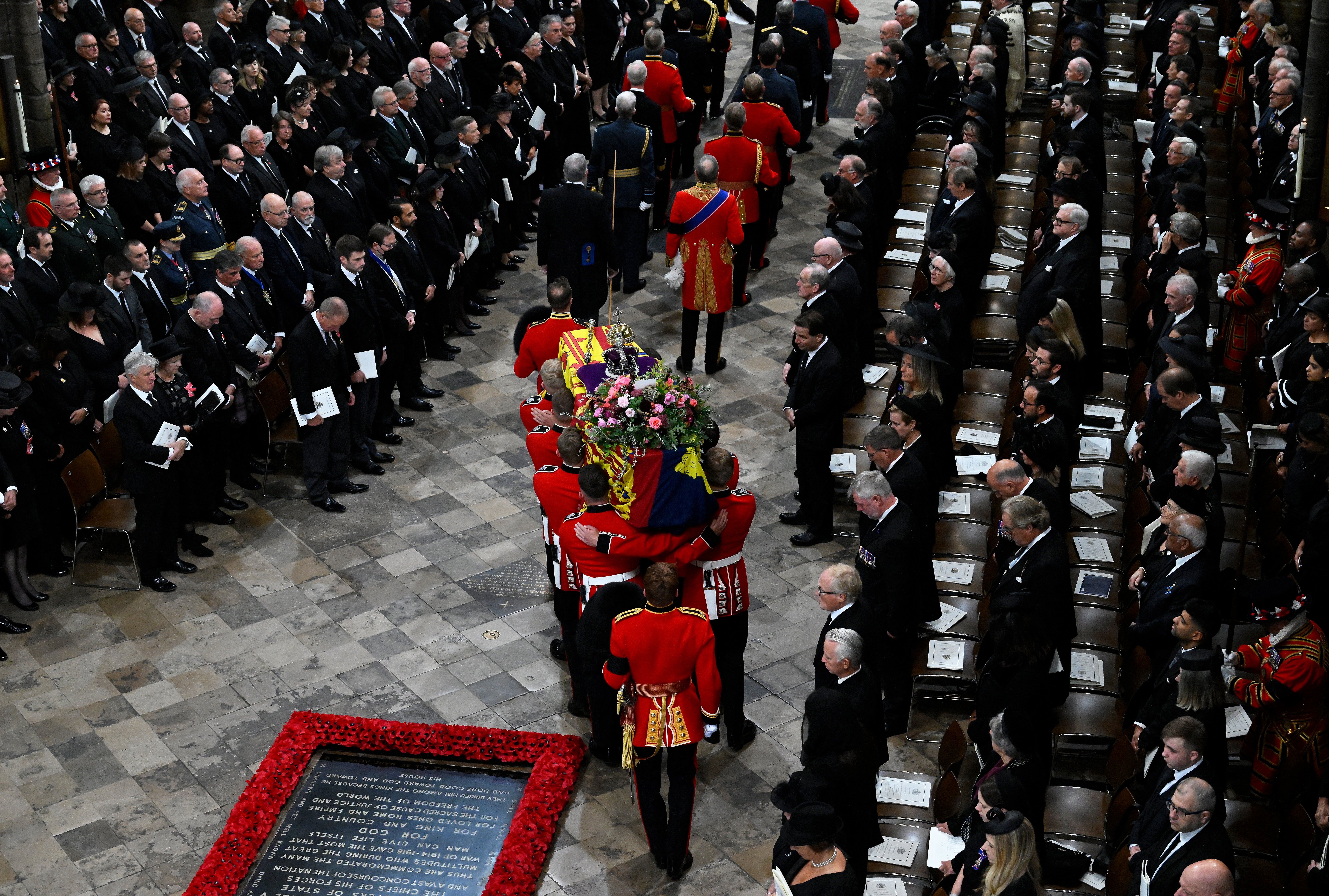 The coffin of the Queen is carried by the bearer party into Westminster Abbey (Gareth Cattermole/PA)