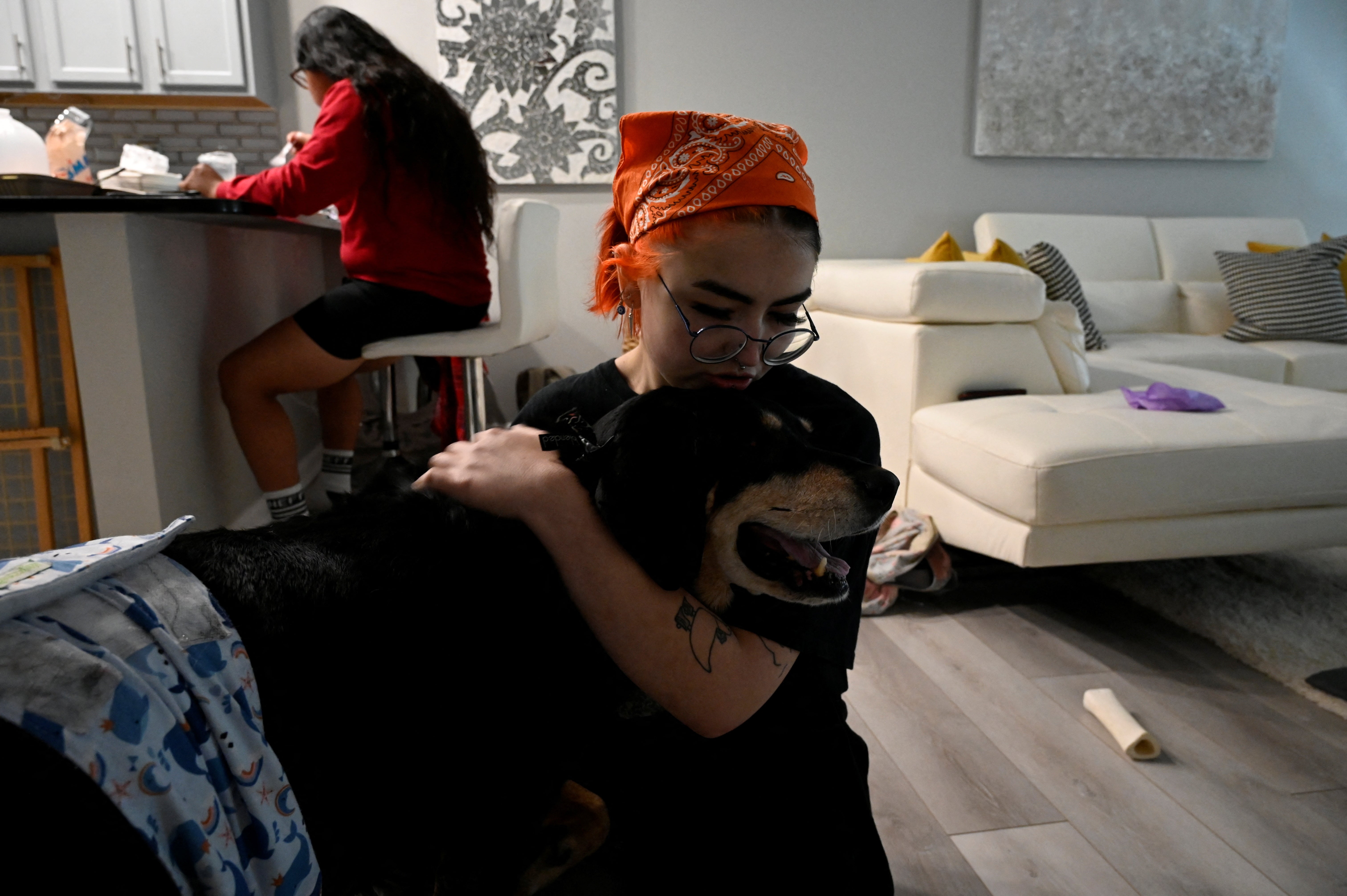 Dwayne, Logan’s emotional support dog, comforts them