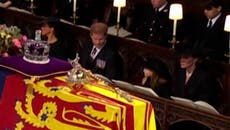 Prince Harry smiles at Princess Charlotte during Queen Elizabeth II's funeral
