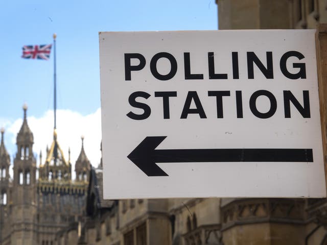 <p>Signage outside a polling station in Westminster</p>