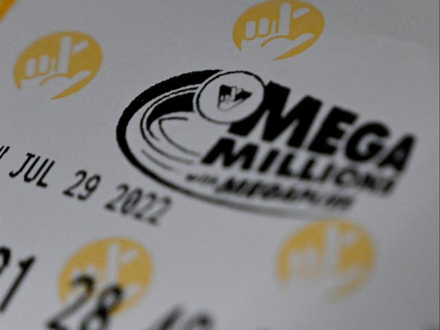 <p>A Mega Millions lottery ticket at a store on July 29, 2022 in Arlington, Virginia</p>