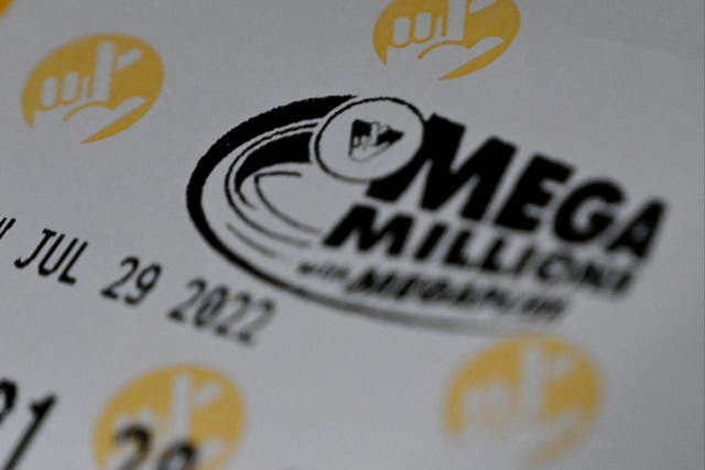 <p>A Mega Millions lottery ticket at a store on July 29, 2022 in Arlington, Virginia</p>