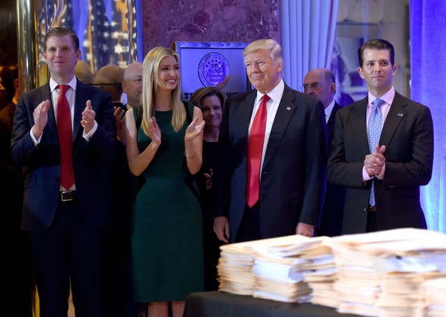 <p>Donald Trump along with his children Eric (L), Ivanka and Donald Jr., arrive for a press conference January 11, 2017 at Trump Tower in New York</p>