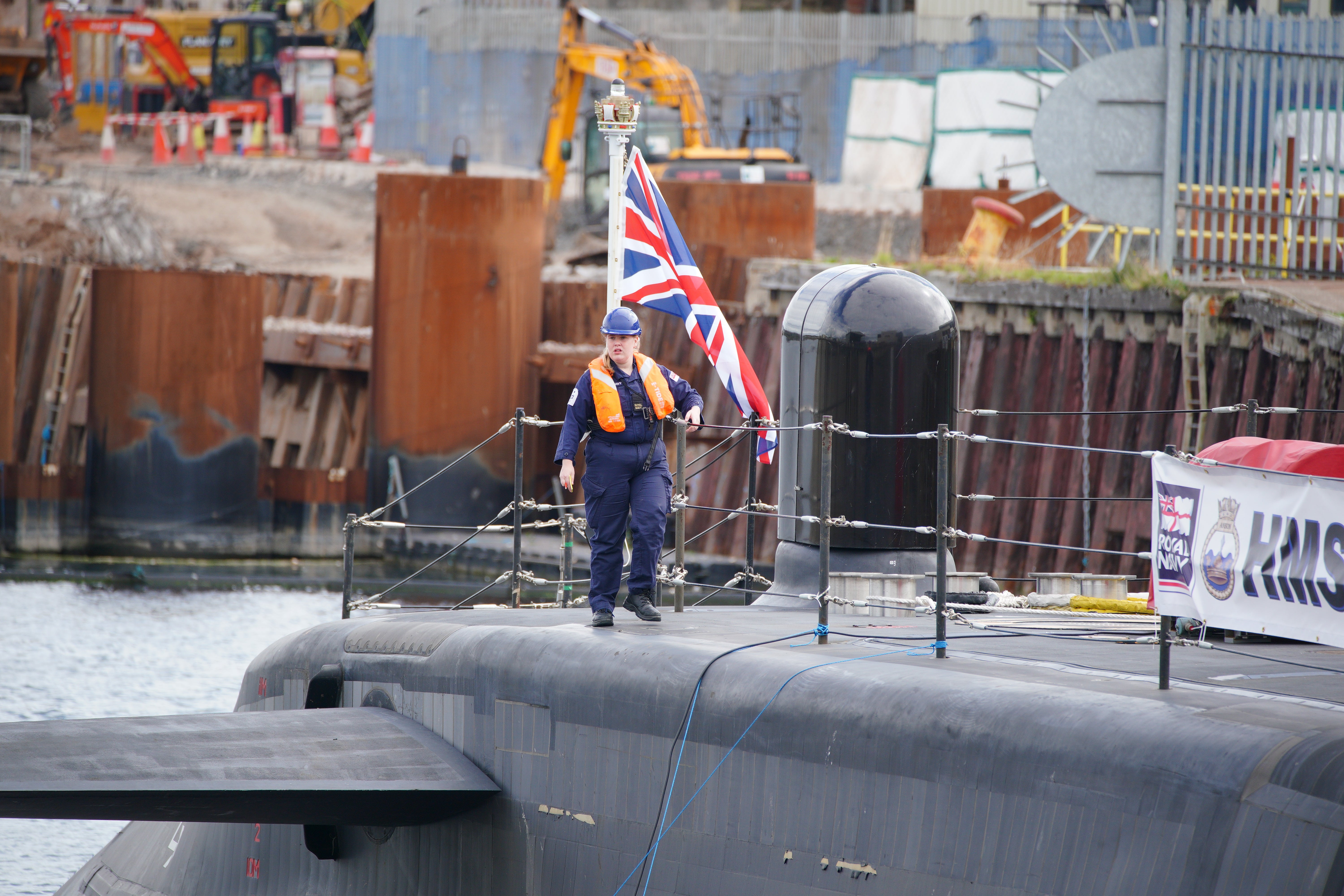 BAE Systems, which makes submarines for the Royal Navy, saw its shares jump on Wednesday (HMS Anson/PA)