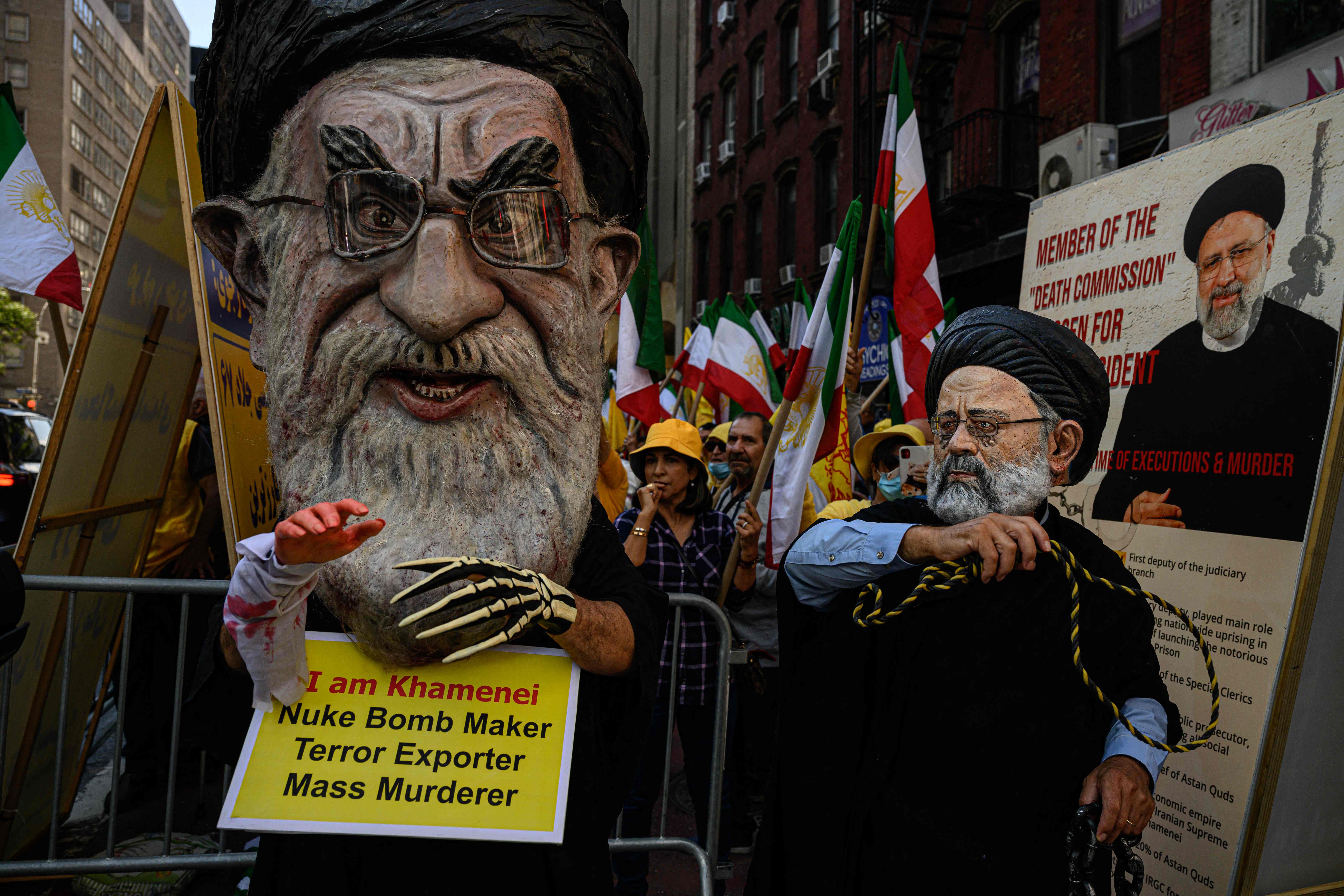 Protesters attend a rally during the UN General Assembly calling for the prosecution of Iran’s president Ebrahim Raisi